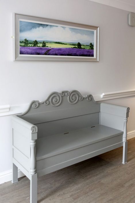 grey hall bench and picture frame